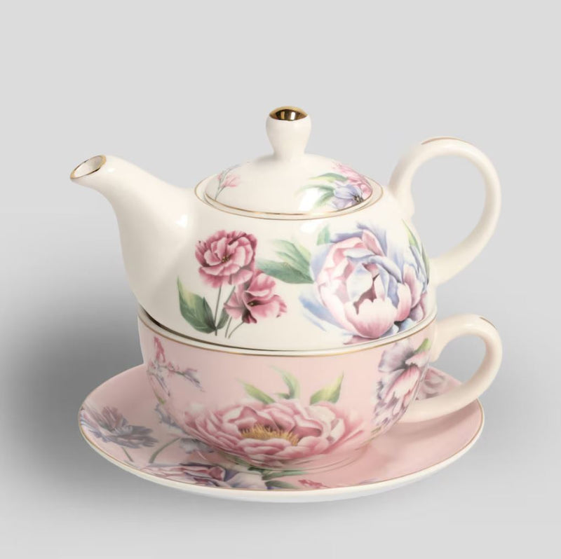 Bielo ružový porcelánový čajník so šálkou s podšálkou s kvetovým motívom.